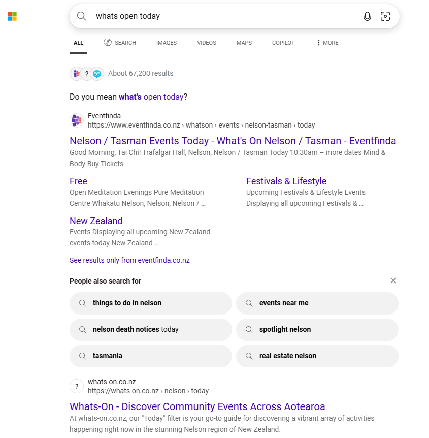 Traditional Bing search results for a local query, showing a list of website links and related searches without an AI-generated answer block.